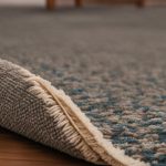 how to get rugs to lay flat on carpet