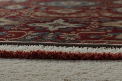 how to keep area rugs in place on carpet